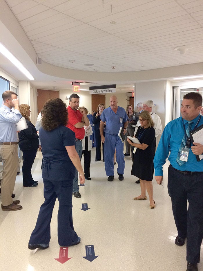 workers input in design hallway
